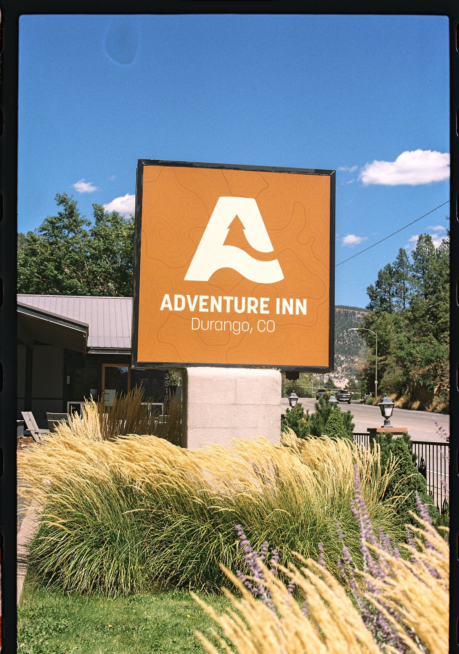The Adventure Inn Durango sign