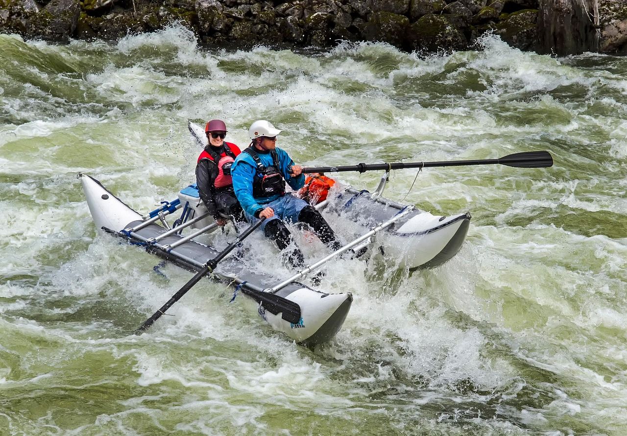 Rafters paddling through whitewater on the Animas River in Durango, Colorado