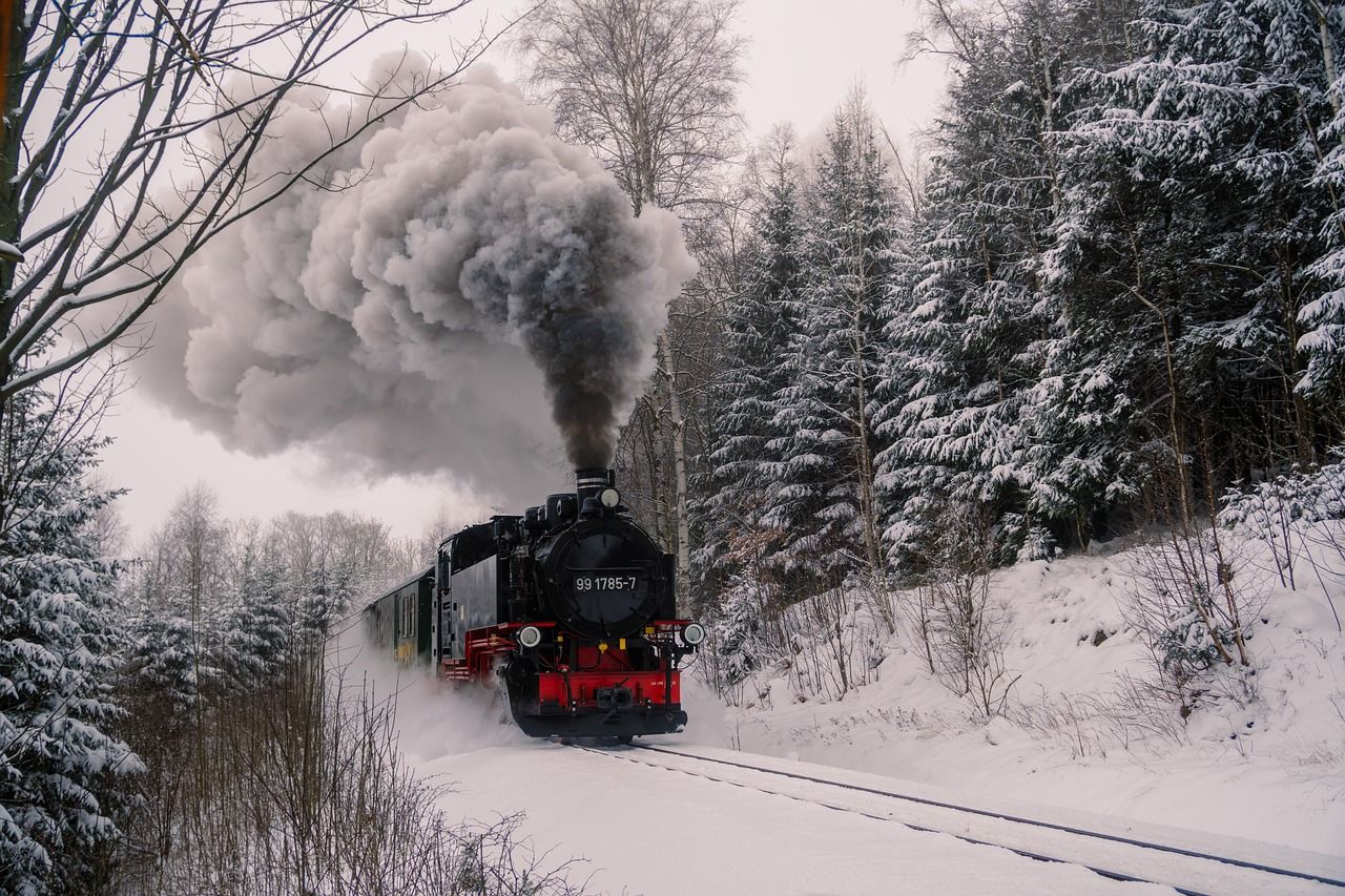 Durango and Silverton Narrow Gauge Railroad steam train traveling through the San Juan Mountains