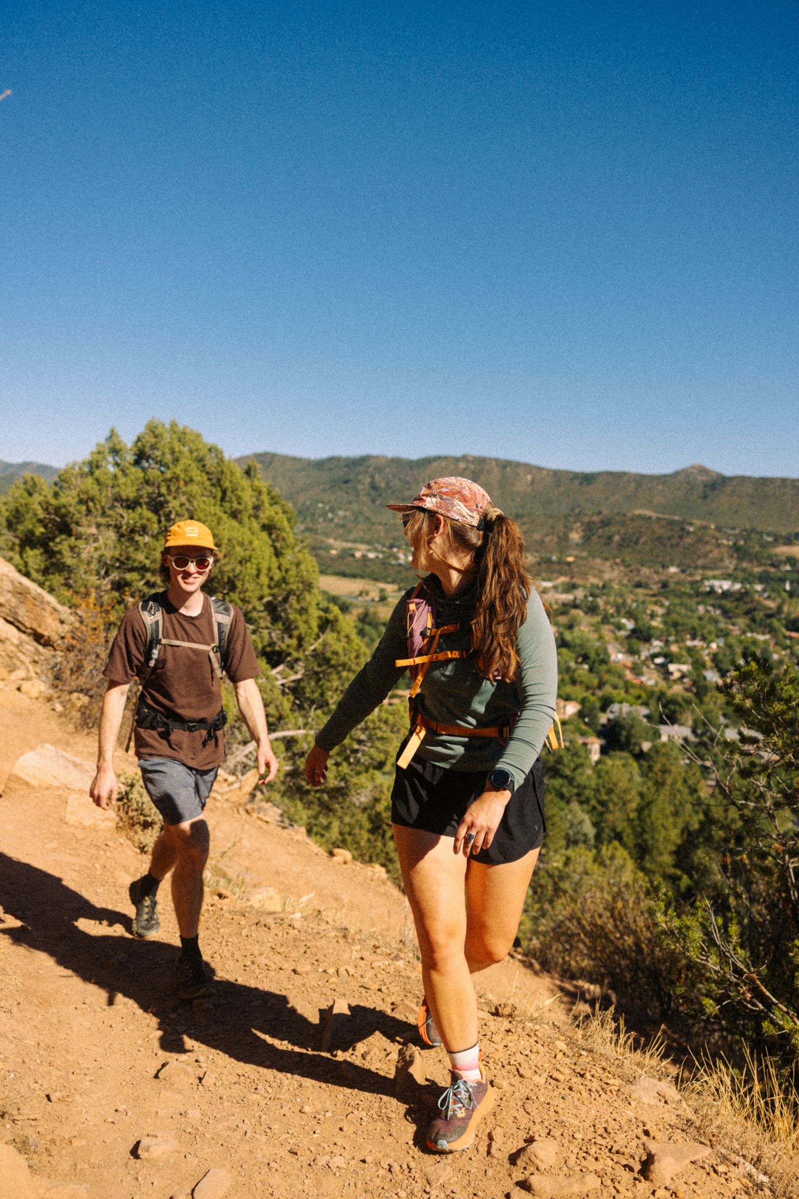 Two hikers on a trail above Durango